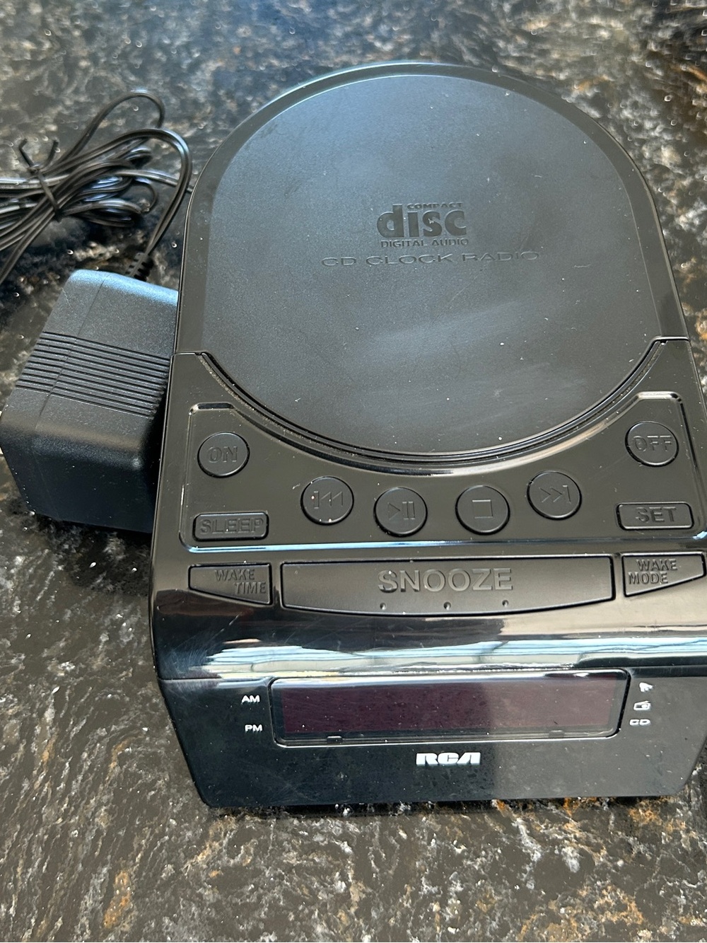 RCA Black Portable CD Clock Radio with Snooze and AM/FM